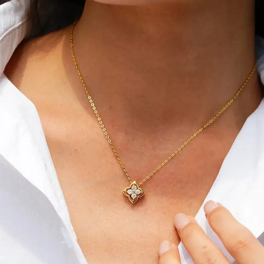 minimalist gold plated clover pendant with moissanite stones