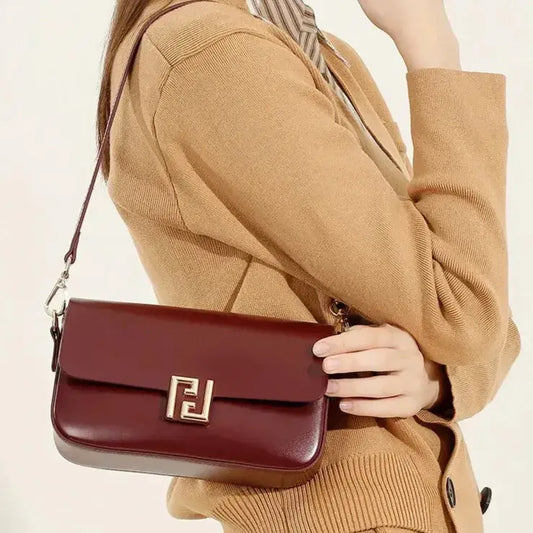 red leather crossbody bag worn crossbody for everyday use