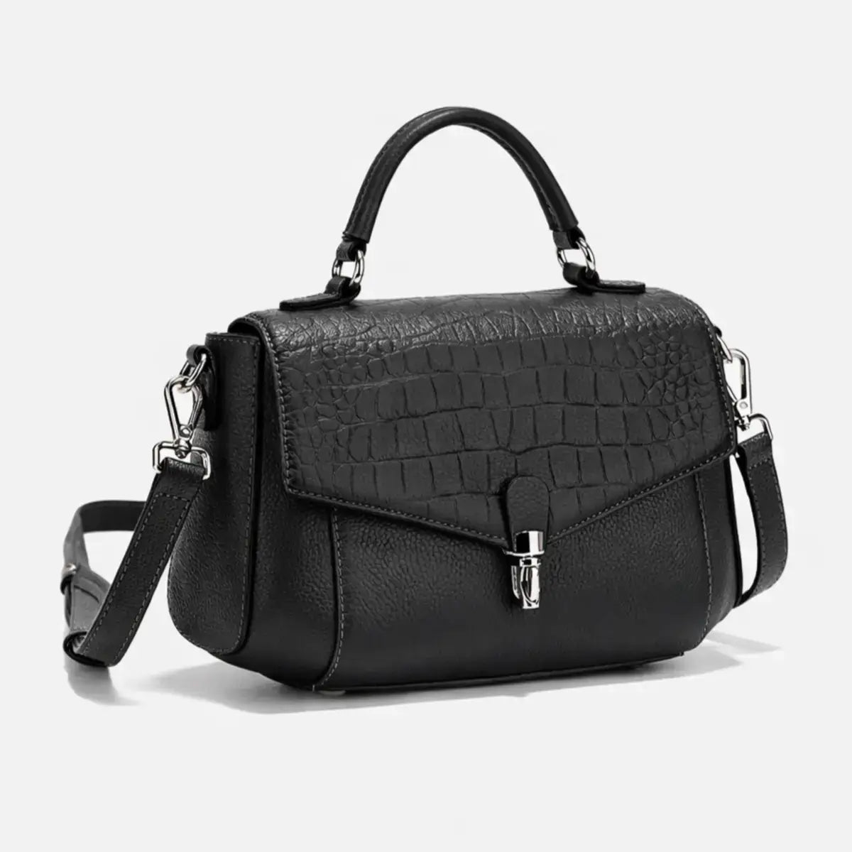 Close-up detail of black crocodile-embossed leather texture.