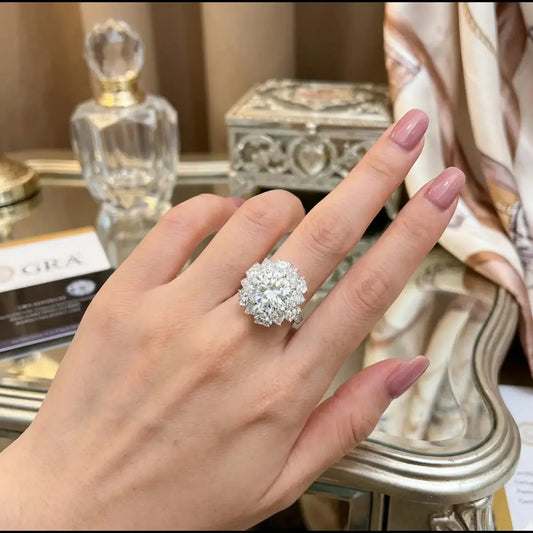 Macro shot of a woman's hand wearing the intricate 5ct Moissanite Lotus Flower Ring in 925 Sterling Silver, showcasing the brilliant D Colour and VVS1 clarity facets.
