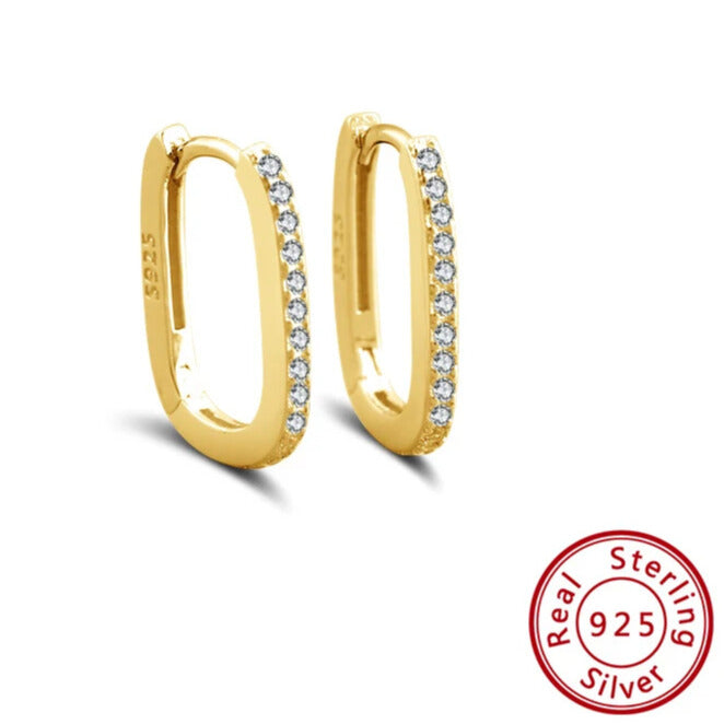 Gold hoop earring with secure clicker fastening, refined finish