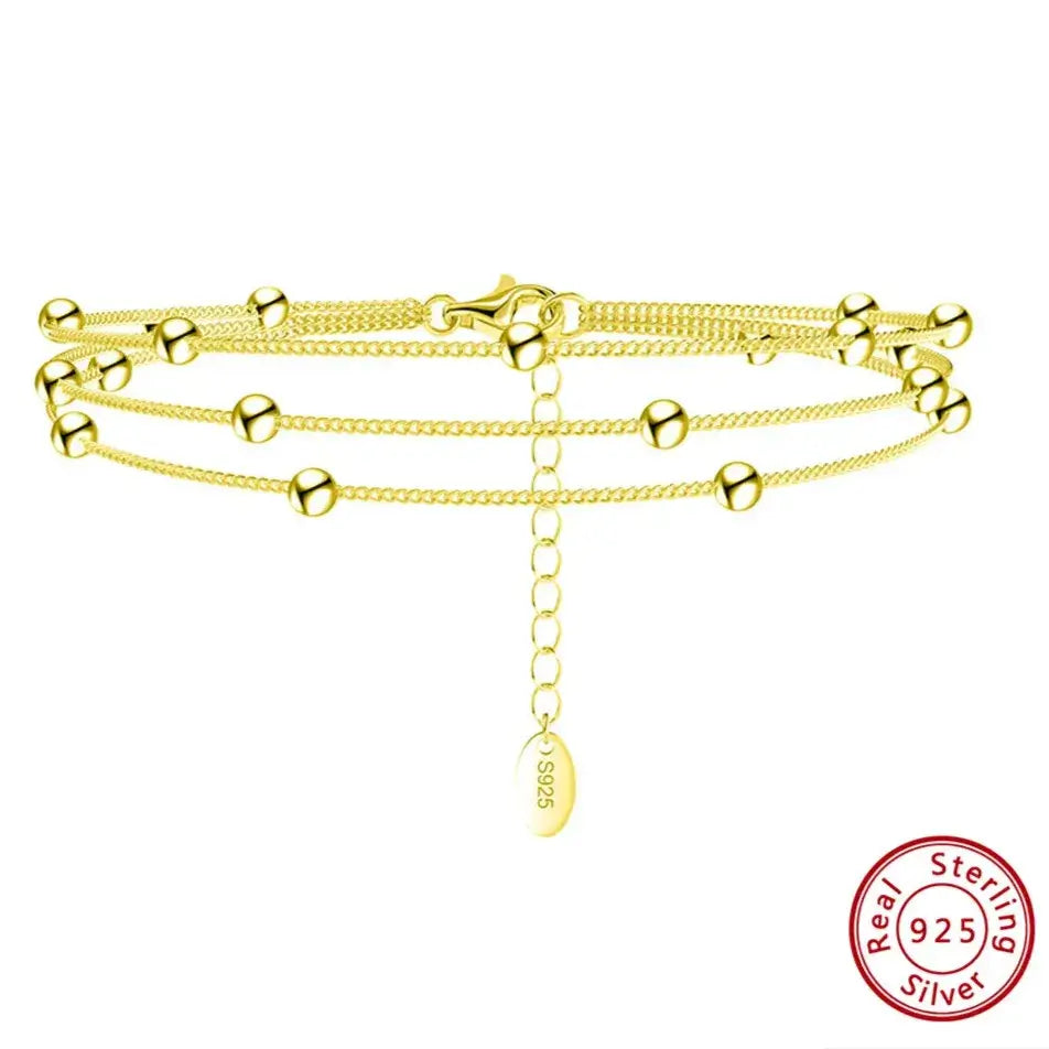 gold-tone triple-layer bracelet polished satellite chain