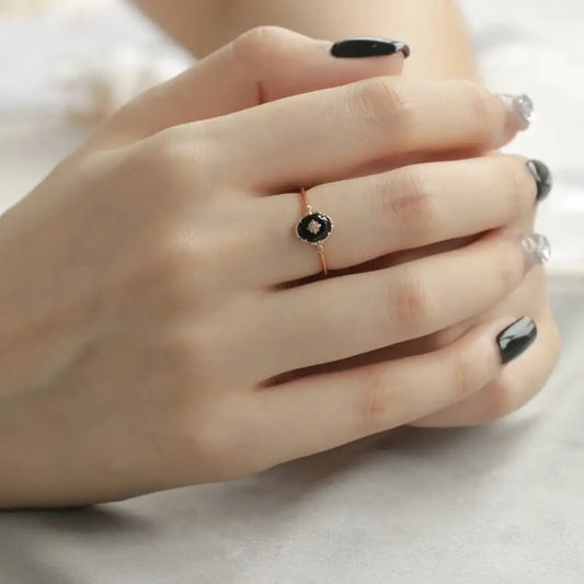 model wearing vintage black agate ring in gold vermeil on hand