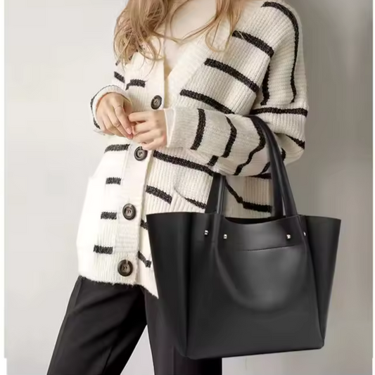 Women’s stylish shoulder tote bag with zipper closure and appliqué detail