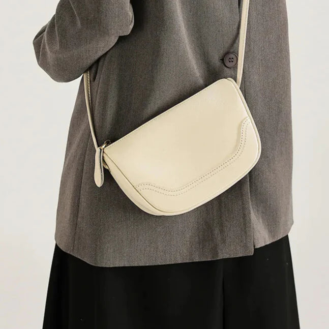 Women’s leather phone bag — shoulder carry, compact and organised