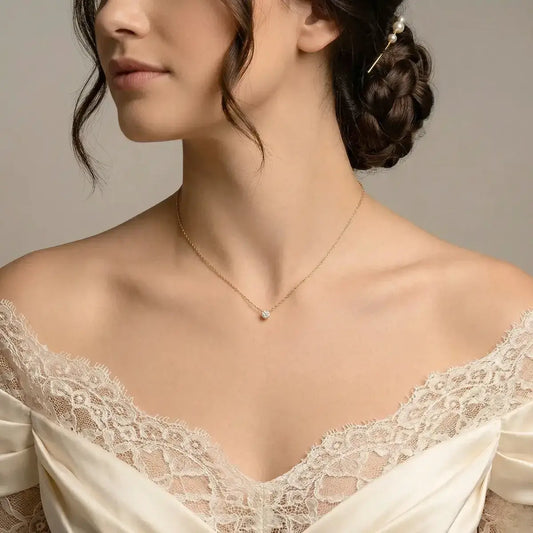 Elegant woman wearing the Gold Round Cubic Zirconia Pendant Necklace in 925 sterling silver, showcasing a refined and minimalist look.