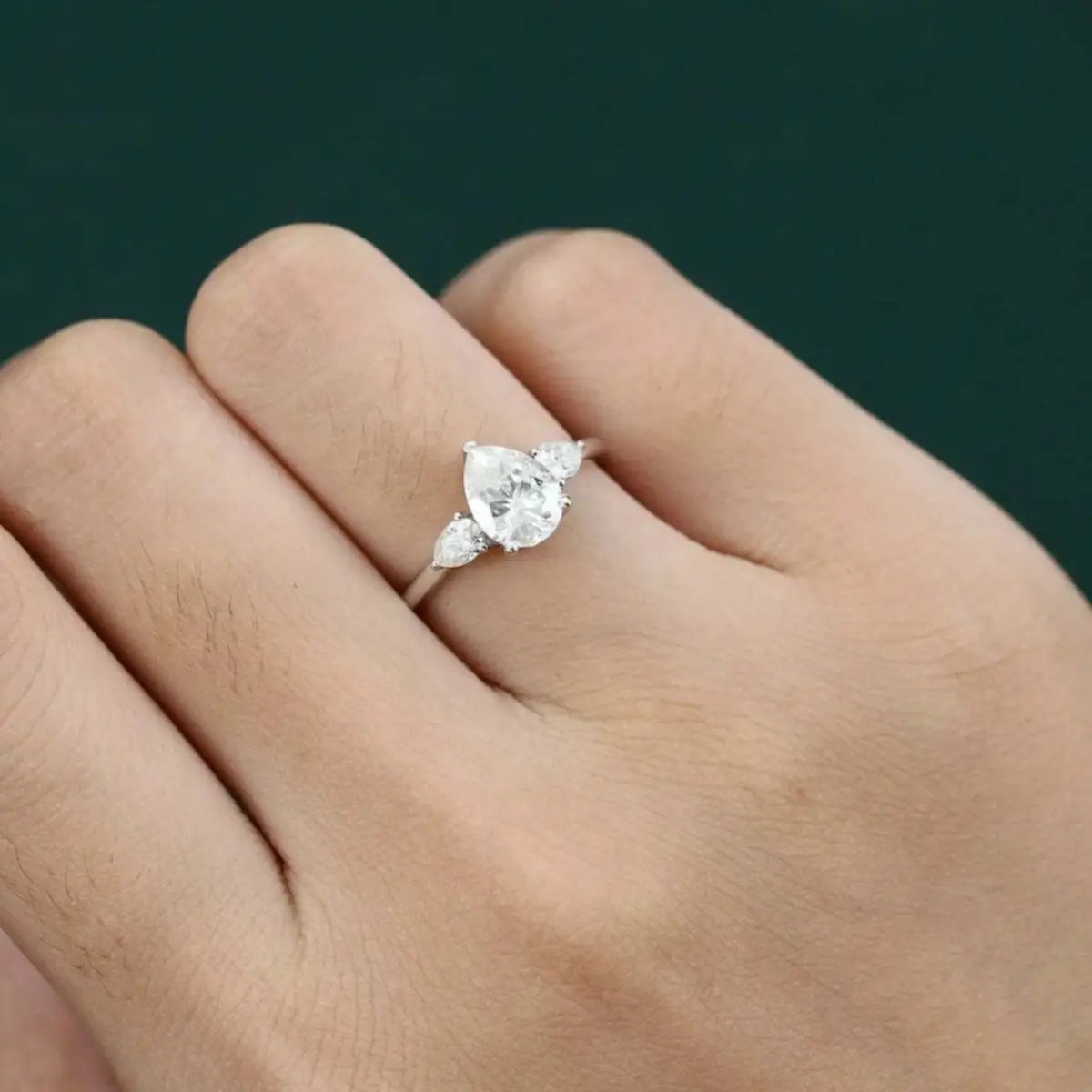 Elegant 1ct moissanite solitaire ring in bright white silver finish.