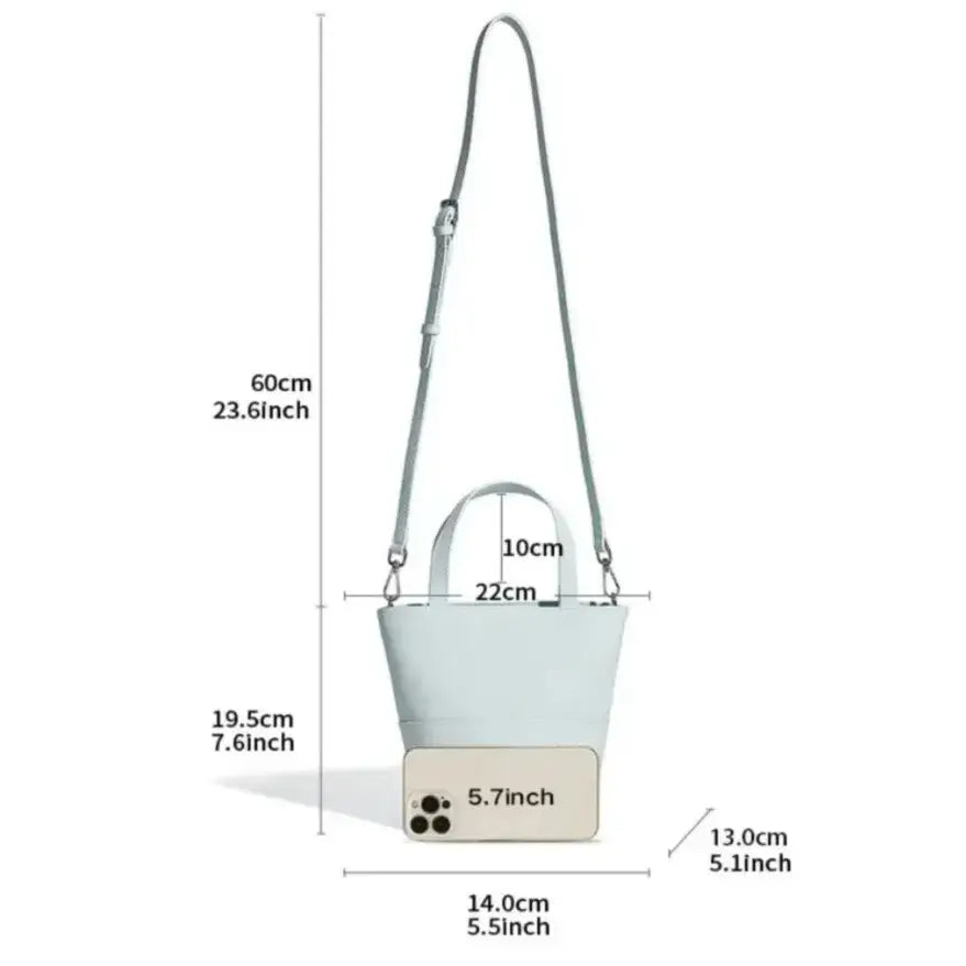 minimalist beige leather bucket bag lifestyle detail of size