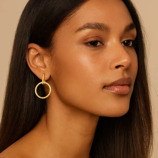 gold zircon hoop earrings on model ear
