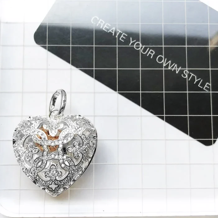 high polish silver locket pendant with sparkle