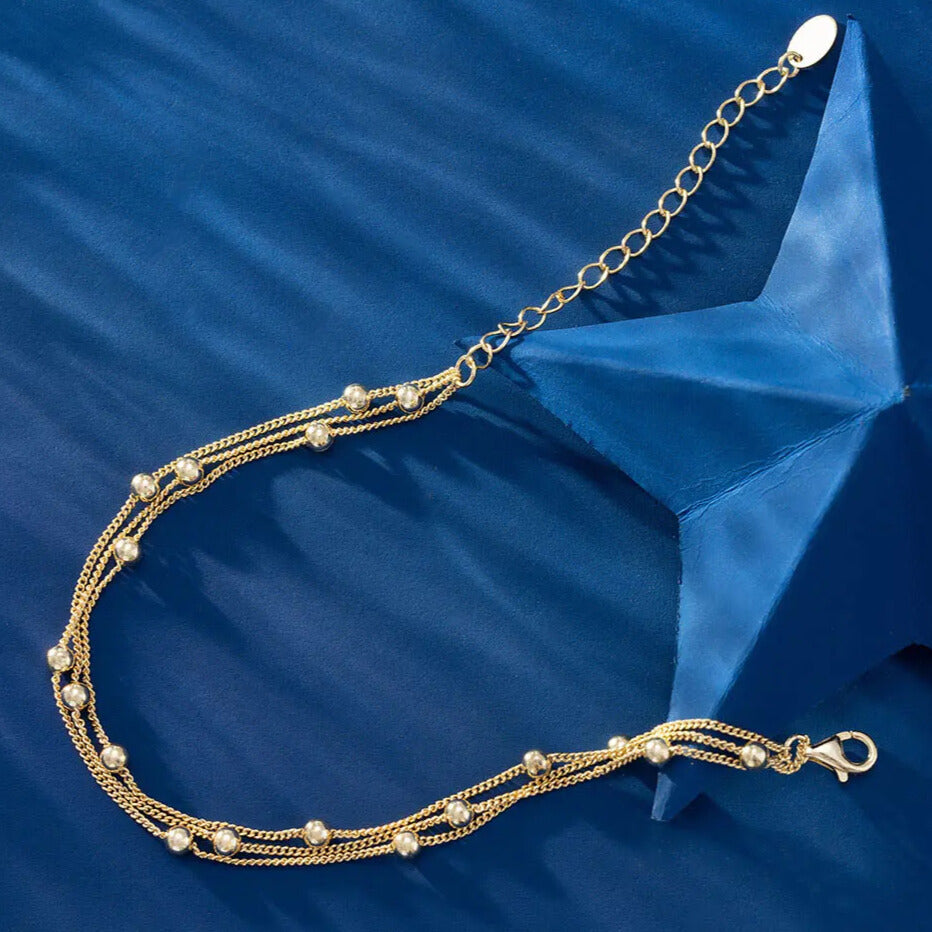 Luxury bracelet for women in silver and gold triple satellite chain