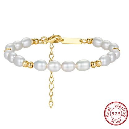 Luxury women’s jewellery – pearl and gold beads bracelet with silver chain