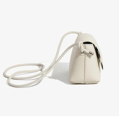 Refined stitching on luxury leather handbag — macro