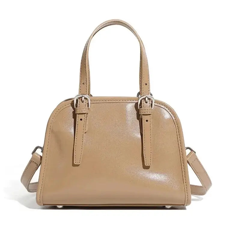minimalist leather crossbody bag beige front view