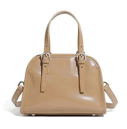 minimalist leather crossbody bag beige front view