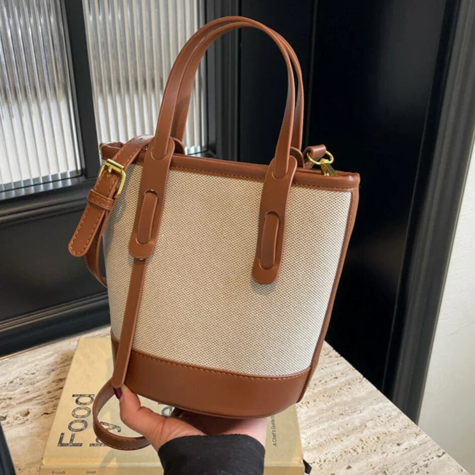 Brown canvas crossbody bucket bag