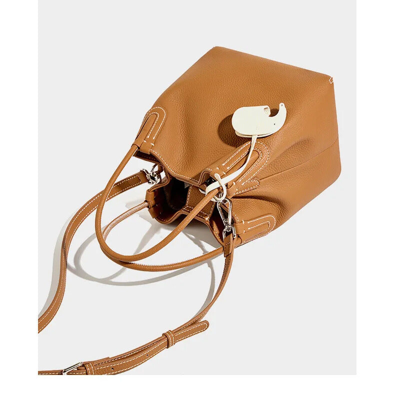 Genuine leather bucket bag texture – minimalist designer detail