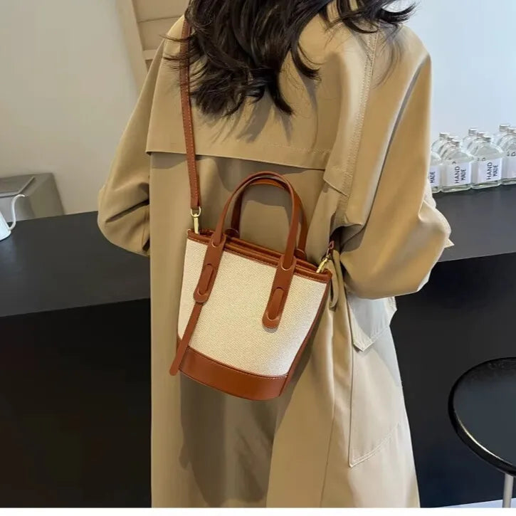 womens brown canvas tote structured bucket silhouette