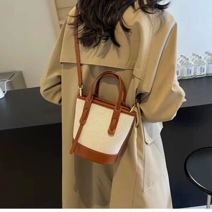 womens brown canvas tote structured bucket silhouette