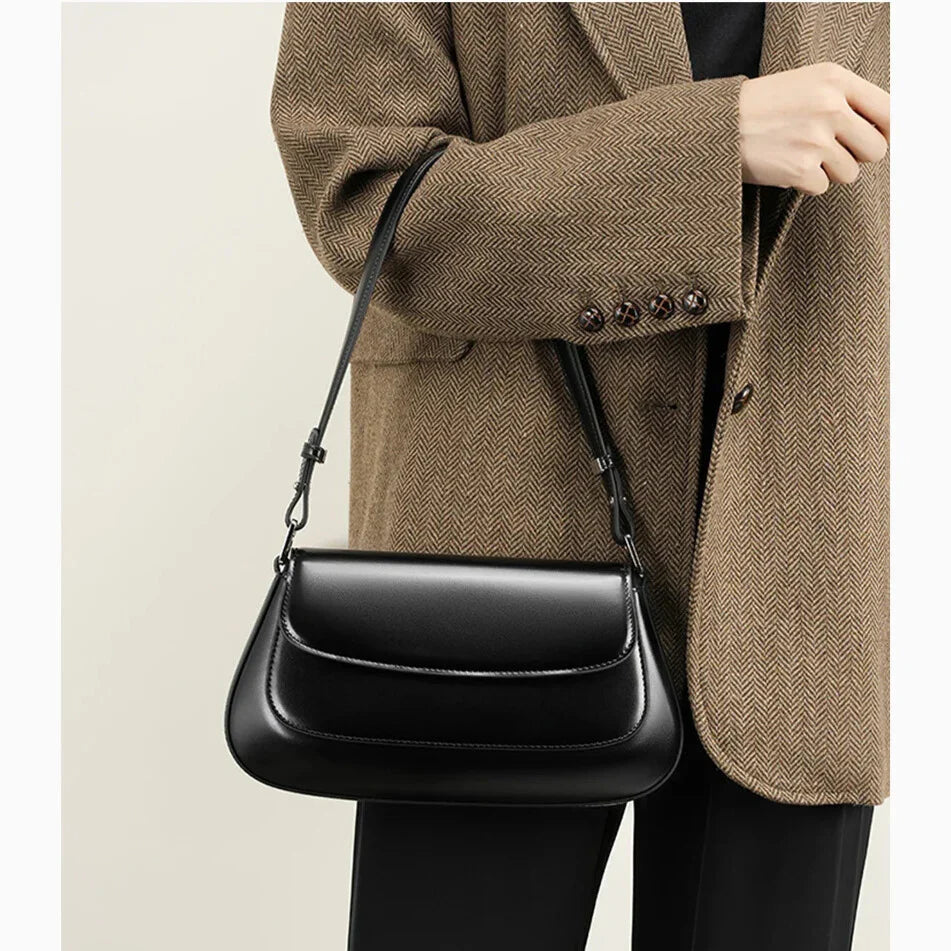 aurora black genuine leather shoulder bag on model