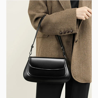 aurora black genuine leather shoulder bag on model