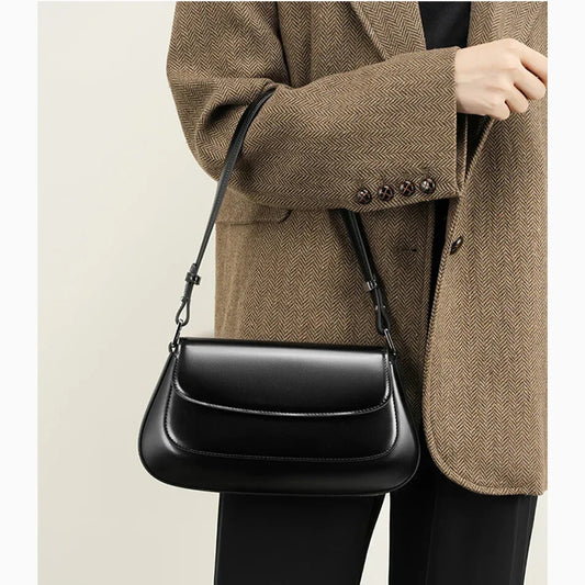 aurora black genuine leather shoulder bag on model