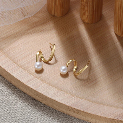 polished gold plated pearl studs uk
