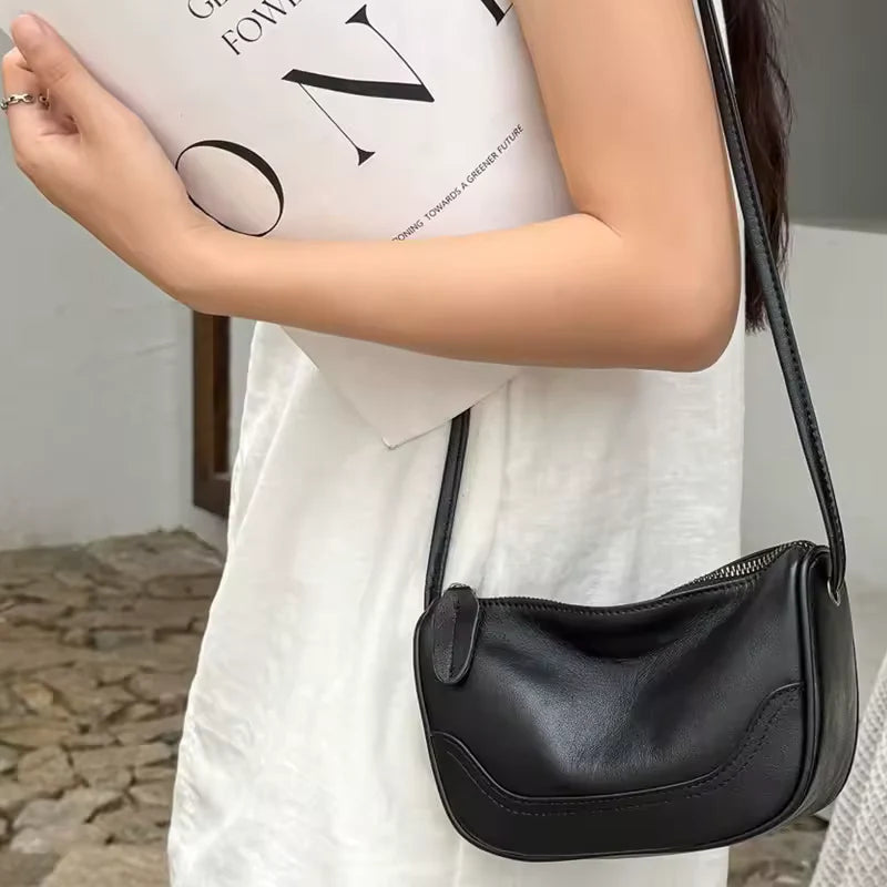 Leather phone crossbody — interior with phone sleeve, card slots and zip pocket