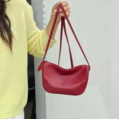 VintageCharm mini bag — worn crossbody for travel and concerts