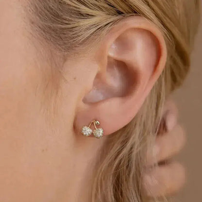 cherry zirconia studs on ear gold tone