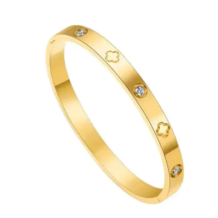 gold clover bangle with zircon stones close-up