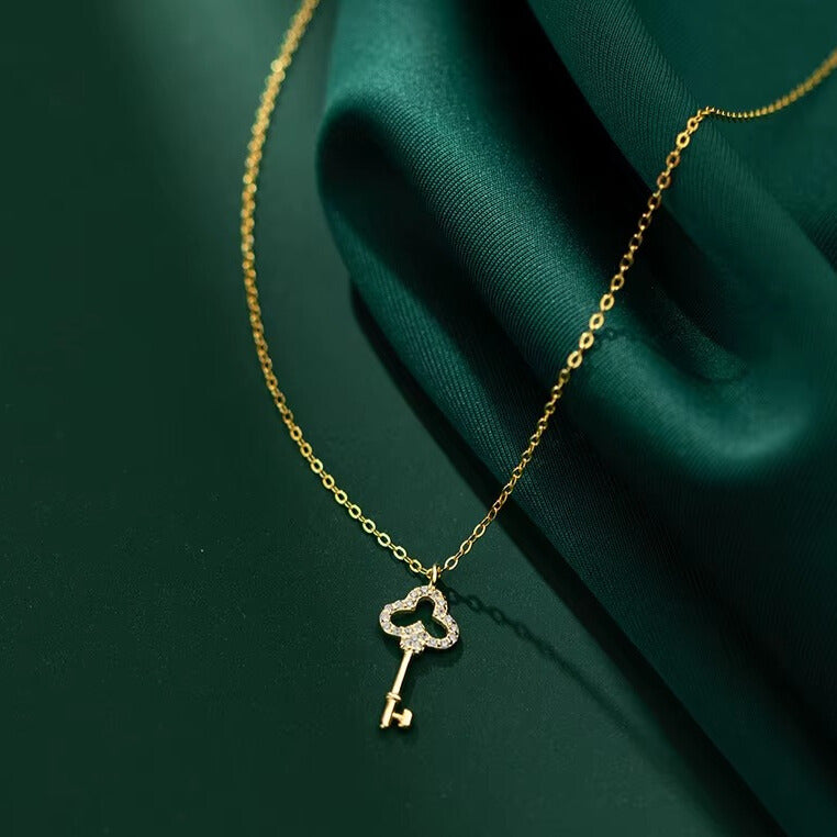 delicate clover key charm necklace in sterling silver gold plated