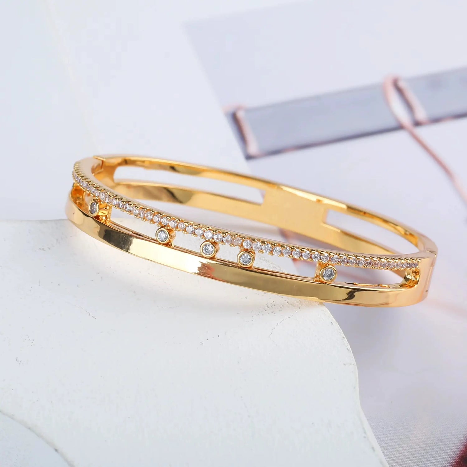 elegant gold slider bracelet featuring brilliant cubic zirconia stones