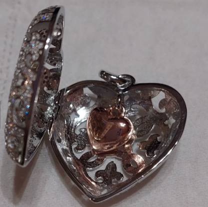 classic romantic locket with inner heart motif