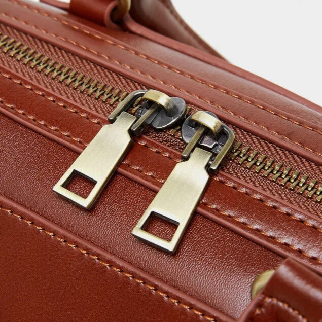 Elara Elegance brown leather handbag with zipper and compartments