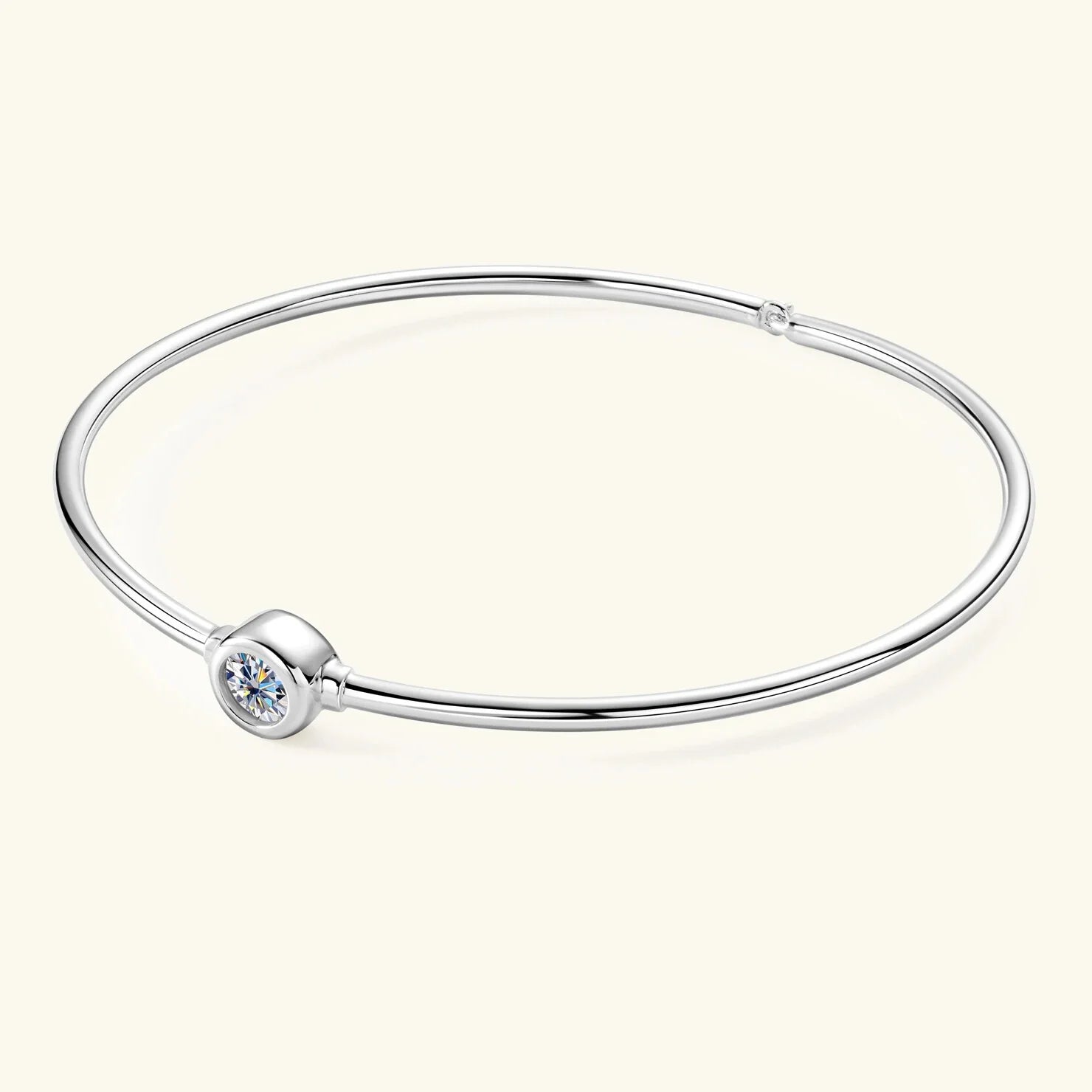 Sterling silver moissanite bangle, round-cut stone detail