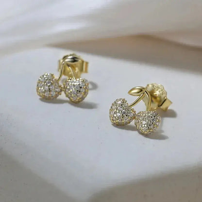 elegant gold cherry earrings lifestyle 