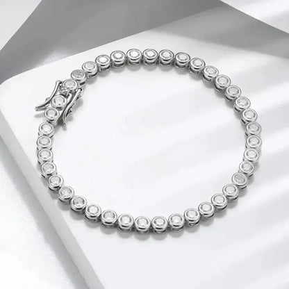 close-up of polished 3 mm AAAA cubic zirconia stones set in silver