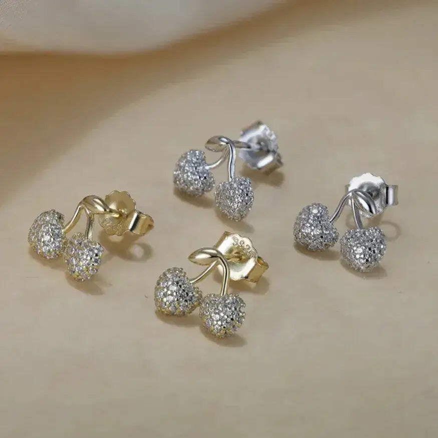 5a zirconia cherry motif macro gold and silver