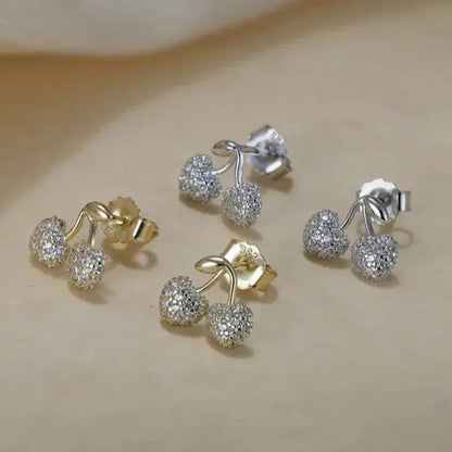 5a zirconia cherry motif macro gold and silver