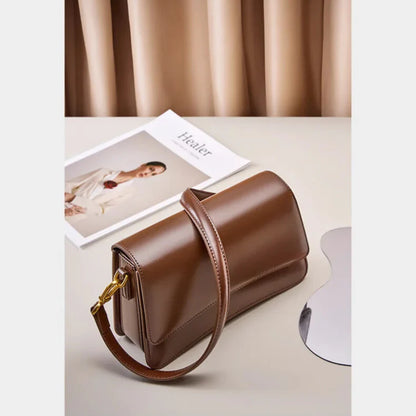 Diamond design baguette — zip & clasp closure, structured silhouette