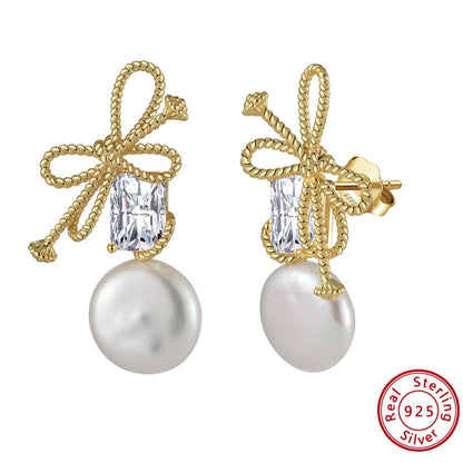sterling gold baroque pearl earrings with bow knot design elegant timeless jewellery
