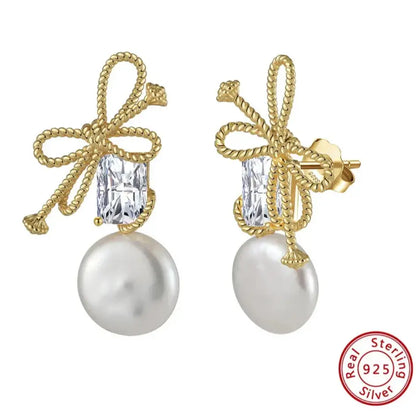 sterling gold baroque pearl earrings with bow knot design elegant timeless jewellery