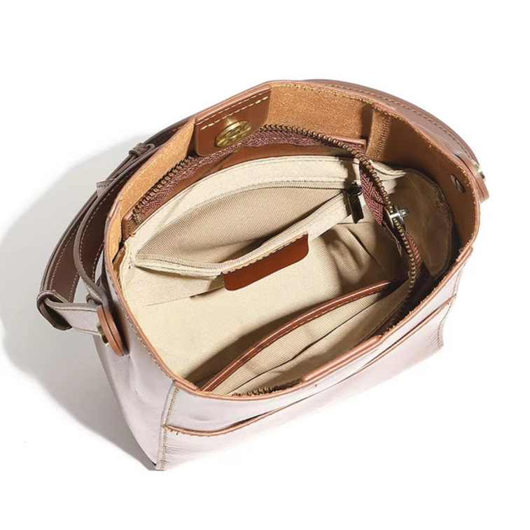 inside view of elegantia alira brown leather bucket bag showing neat compartments
