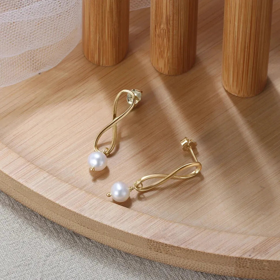 timeless gold pearl earrings elegantia jewellery uk