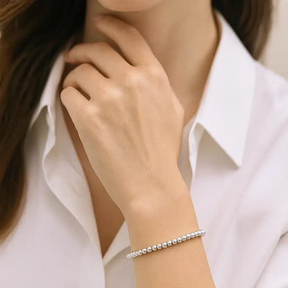 woman wearing sterling silver bracelet