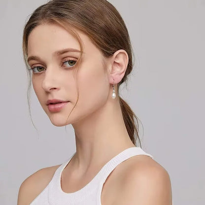 minimalist sterling silver pearl dangle earrings for women uk