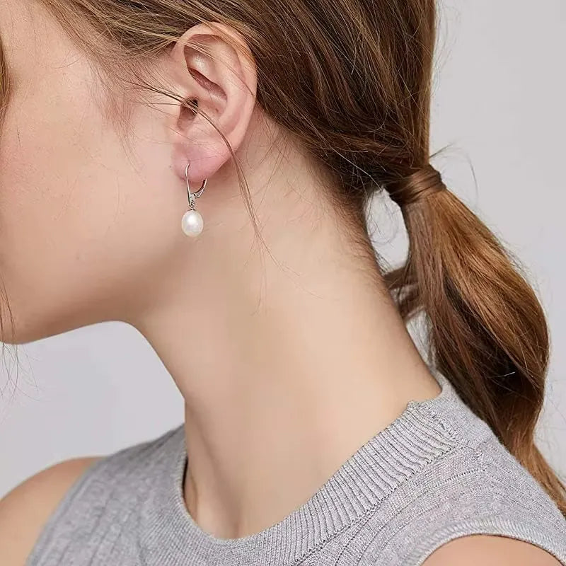 delicate silver pearl drop earrings hypoallergenic