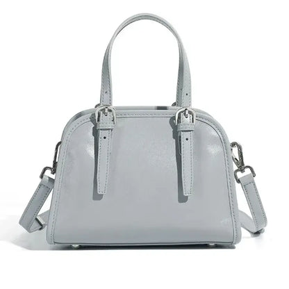 minimalist leather crossbody bag baby blue front view