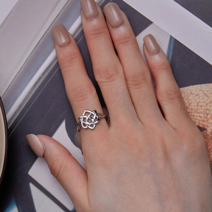 Women’s Celtic love knot ring with slim 1.5 mm band